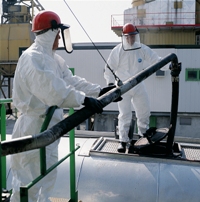 Oil Workers wearing Tyvek® coveralls